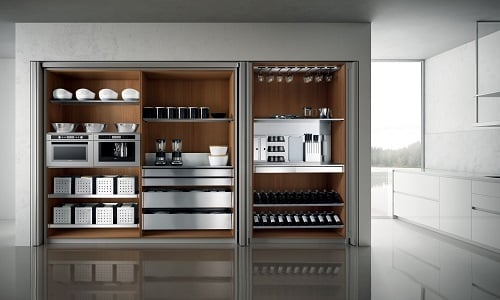 Luxury Italian kitchen tall cabinets with integrated appliances, open shelving, drawers, and organized pantry storage.