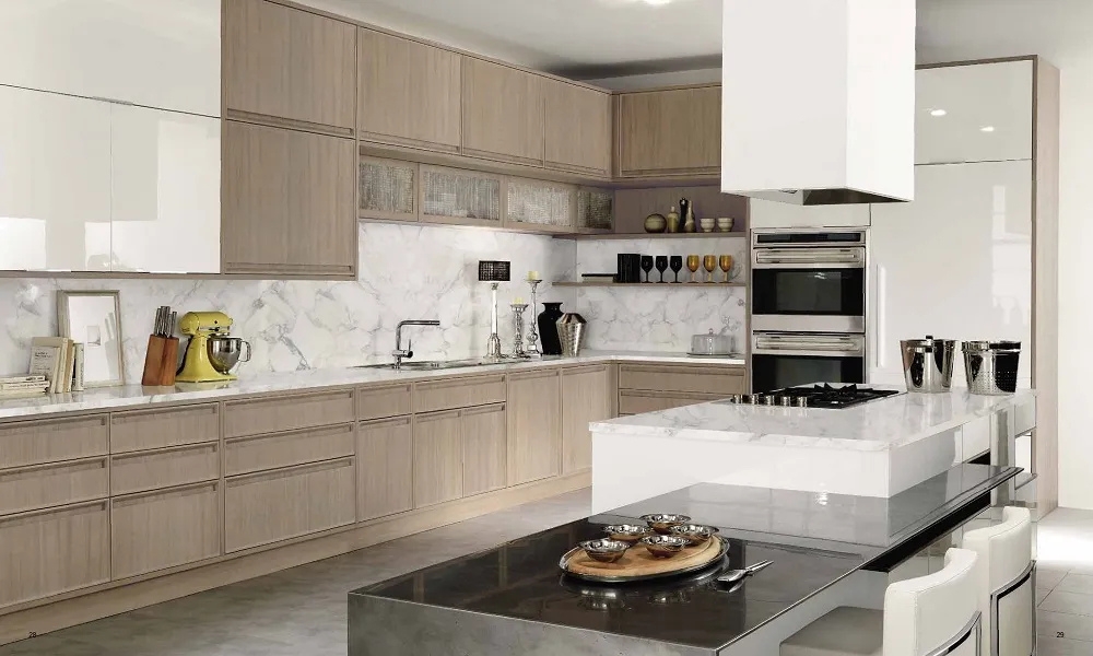 Timeline kitchen by Aster Cucine featuring light wood cabinetry, marble backsplash, modern island, and contemporary Italian design in a NYC–NJ luxury home.