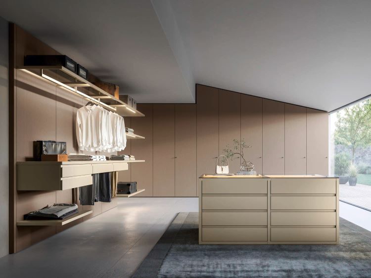 Luxury walk-in closet system in NYC with custom panel walls, island drawers, open shelving, and integrated LED lighting