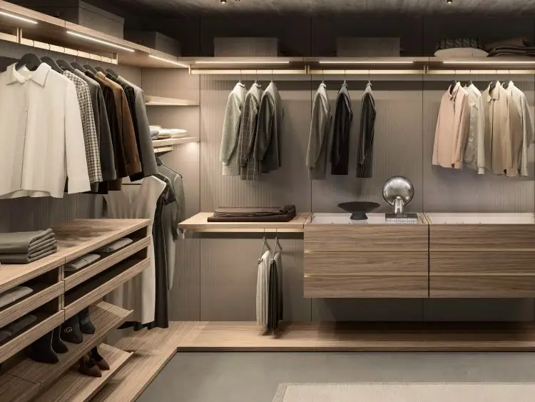 Luxury walk-in closet system in NYC with custom wood panels, integrated LED lighting, hanging rails, drawers, and tailored wardrobe storage
